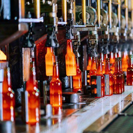 Amber glass bottles remanufacturing in a factory